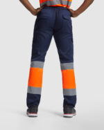Pantalón HV9300 NAOS Alta Visibilidad color marino/naranja fluor