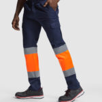 Pantalón HV9300 NAOS Alta Visibilidad color marino/naranja fluor